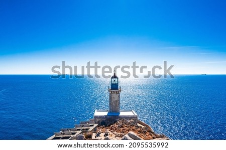 View on Lighthouse at cape Tainaron lighthouse in Mani Peloponnese, the southernmost point of mainland Greece Royalty-Free Stock Photo #2095535992