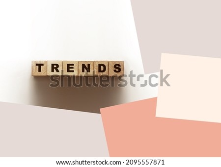 Wooden Blocks with the text trends. Trend word made with building blocks. Business concept.