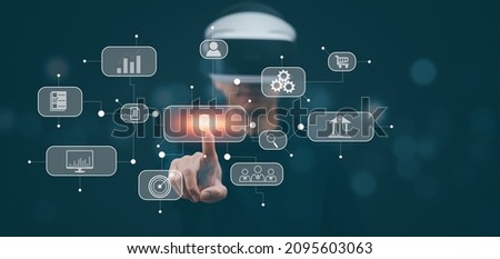 Man wearing VR glasses virtual touchscreen on the graph Screen Icon of a media screen, Technology Process System Business with Communication and marketing concept, big data, HR Human, Business success