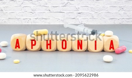 word aphonia on white large pills