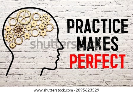 Practice Makes Perfect write on the paper on the cork board.