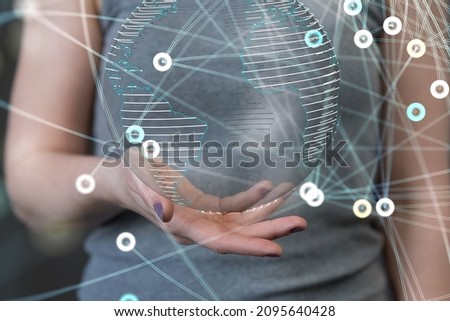 A 3D rendered futuristic globe with data connected to each other held in a person's hand