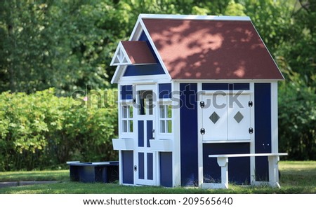 playhouse  in the backyard for kids Royalty-Free Stock Photo #209565640