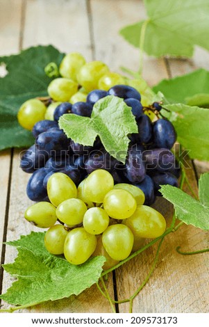 Ripe  grapes with leaves