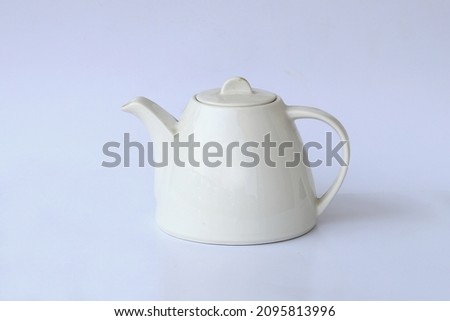 White porcelain tea pot isolated on white background