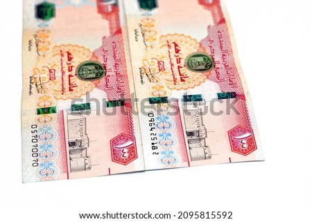 Selective focus of 100 AED one hundred Dirhams banknote bill currency of United Arab Emirates UAE with a picture of Al Fahidi Fort isolated on white background