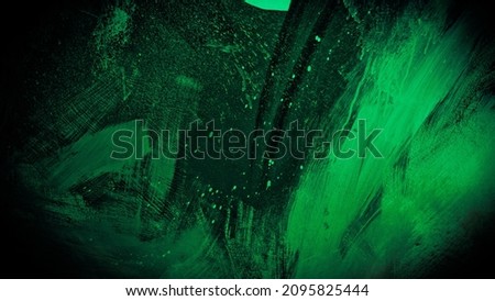 Background splashes of acrylic paints wall, combination of black and green, creative background with shabby paint, loft background. Creative horror texture copy space. Artistic wall. Halloween backgro Royalty-Free Stock Photo #2095825444