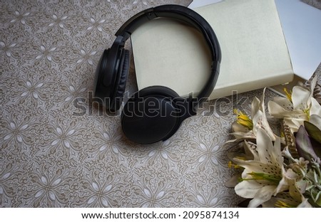 listening to music while I put my books on the antique tablecloth of my thoughts