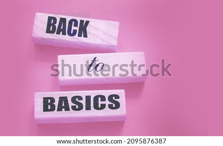 The words back to basics made of letters on wooden blocks. back to basics - fundamental principles concept