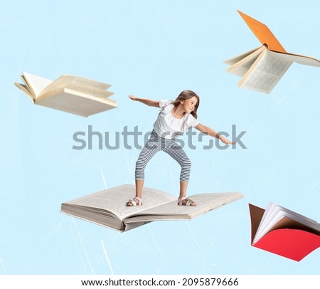 Contemporary art collage of little cheerful girl, child surfing on open book isolated over light blue background. Concept of education, childhood, book reading, discovery, artwork, inspiration and ad Royalty-Free Stock Photo #2095879666