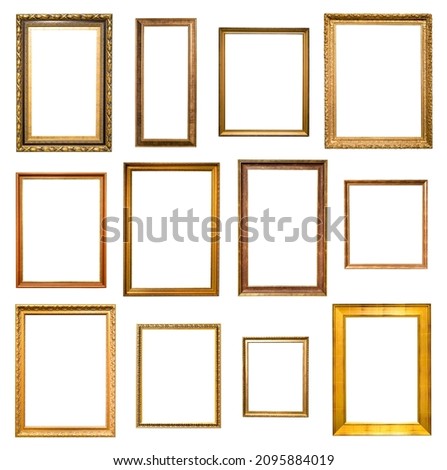 set of various vertical wooden picture frames with blank canvas cutout on white background