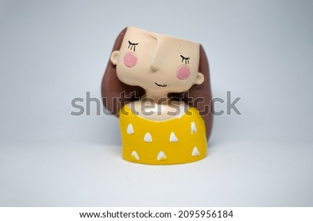 small cute basket girl succulent resin planter Plant Container Decorative Showpiece Royalty-Free Stock Photo #2095956184