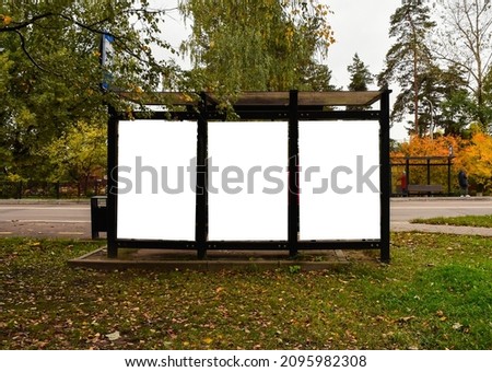 Empty blank billboard at station. bus stop with white billboard. Set of billboards. frames. Blank billboard located on bus stop on the street. Nobody. Royalty-Free Stock Photo #2095982308