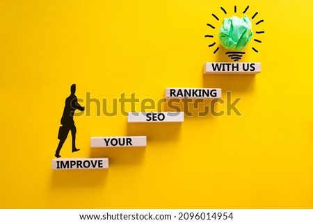 Improve your SEO ranking with us symbol. Wooden blocks with words Improve your SEO ranking with us. Businessman icon. Beautiful yellow background, copy space. Business, improve SEO ranking concept. Royalty-Free Stock Photo #2096014954