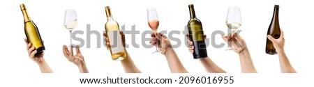 Collage of hands holding various wine bottles and wine glasses isolated over white background. Delicious wine degustation. Concept of alcohol, drink, party, degustation, holiday. Copy space for ad Royalty-Free Stock Photo #2096016955