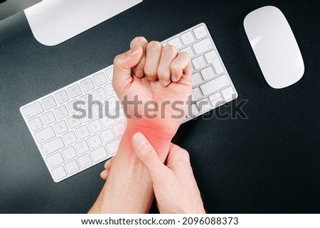 Carpal tunnel syndrome. Hand pain in man injury wrist. Arthritis office syndrome is consequence of computer. Health care and medical concept