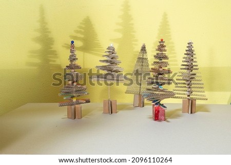 Christmas trees made from cardboard at home.