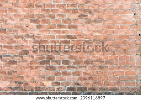 Panoramic background of wide old red brick wall texture. Home or office design backdrop. Stock photo