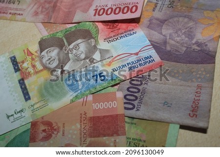 75000 rupiah, Indonesian Rupiah the official currency of Indonesia. paper money,