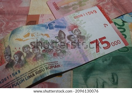 75000 rupiah, Indonesian Rupiah the official currency of Indonesia. paper money,