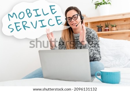 Inspiration showing sign Mobile Service. Conceptual photo Radio communication utility between mobile and land stations Writer Creating New Novel, Professor Checking Student Assignments Online Royalty-Free Stock Photo #2096131132