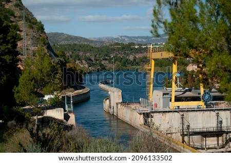 Diversion dam, assut de Xerta, in Ebro river in Xerta, Tarragona with background