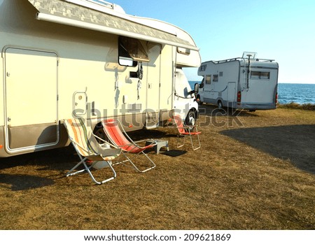 car caravan and chairs 