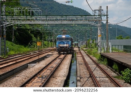 Joetsu Line running in Uonuma City, Niigata Prefecture.Translation: The box at the bottom right says "Up Main Line". Royalty-Free Stock Photo #2096232256