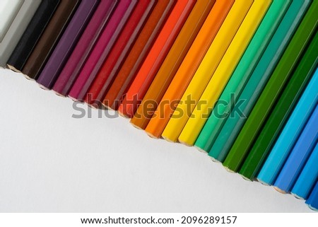colored bright pencils lie on a white isolated background, pencil tips Royalty-Free Stock Photo #2096289157