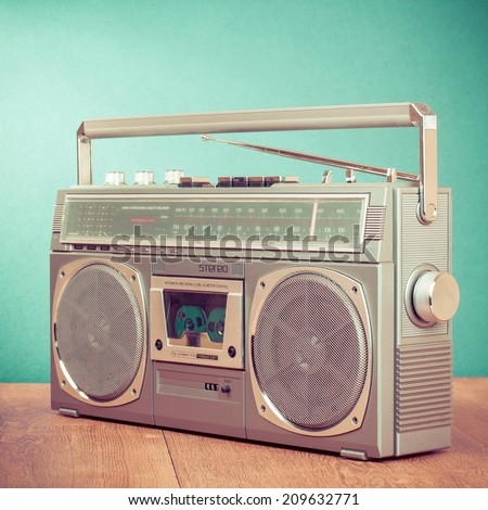 Retro radio cassette stereo recorder front mint green background