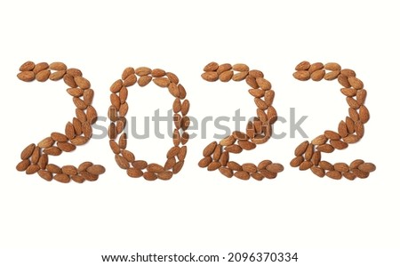2022 Written With Almond on White Background, Conceptual Photo of Happy New Year 2022