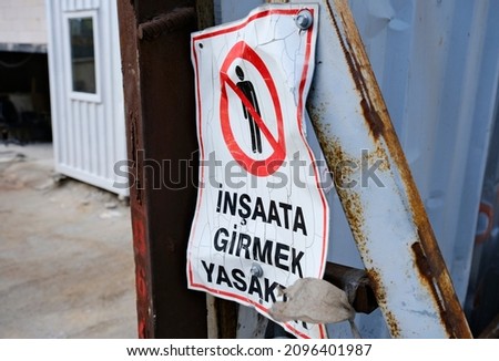 Construction building in ankara Turkey. Iron plate sign written it is forbidden to enter