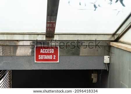Indicative sign that reads -Basement access 2