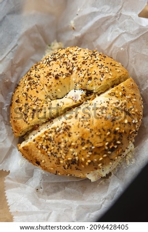 Top shot of Food photo of Everything new york bagel with Cream cheese filling 