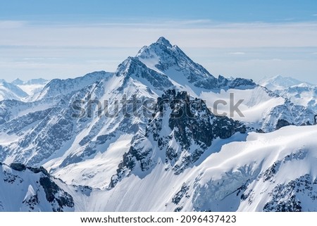Switzerland, Panoramic view on Snow Alps and Blue Sky around Titlis mountain Royalty-Free Stock Photo #2096437423