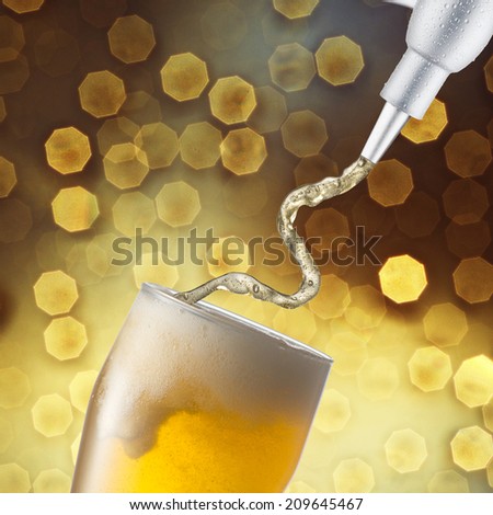 Beer Pour on to glass with light bokeh background