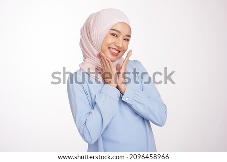 Young beautiful woman wearing hijab over isolated white background smiling cheerful playing peek a boo with hands showing face. Royalty-Free Stock Photo #2096458966