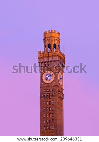 Sunrise over Emerson Bromo-Seltzer Tower in the winter. The historic clock tower in Baltimore downtown.