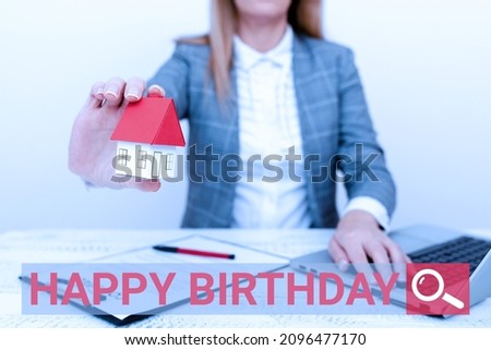 Text sign showing Happy Birthday. Business overview The birth anniversary of a person is celebrated with presents A Young Lady Orbusiness-Woman Calculating Orsigning Loans Ormortagages Orexpences