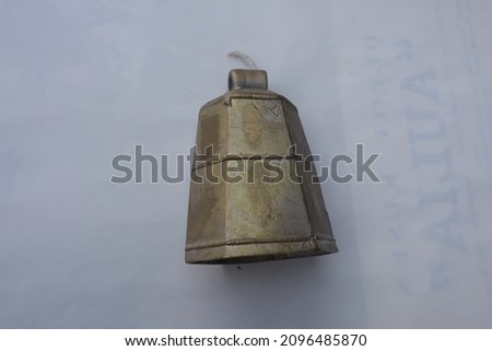 Gold metal bell isolated on white background