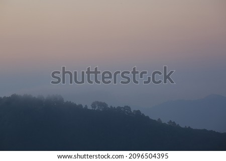 Beautiful view of mountains and white mist