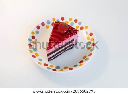 A plate of sweet strawberry cake.