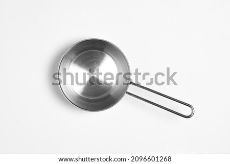 Stainless steel frying pan isolated on white background.High resolution photo.Top view. Mock-up.