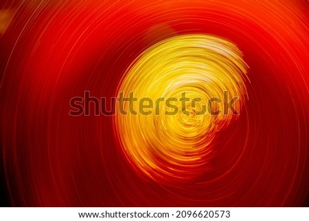 Long exposure concept background photo of bubbles in tea while spinning. The idea of space, time, planets, galaxies, black holes.