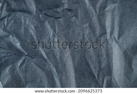 A close-up picture of the crumpled black korea traditional paper