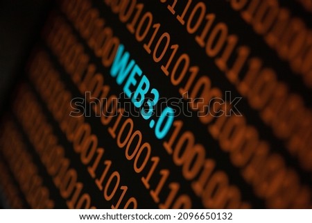 Close up of Binary codes on screen and WEB3.0 word in the middle - New Decentralized Internet - Smart Contract and Digital Ownership Royalty-Free Stock Photo #2096650132