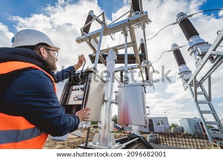 Engineer electrician check the substation construction process Royalty-Free Stock Photo #2096682001