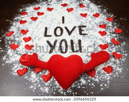 the inscription I love you. red hearts surround the image. background for valentine's day