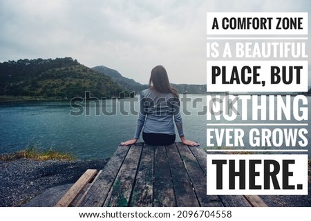 Inspirational and Motivational quote write on girl sitting near Lake background. Success quote.