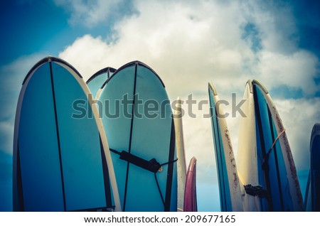 Retro Style Photo Of Vintage Hawaiian Surf Boards Royalty-Free Stock Photo #209677165
